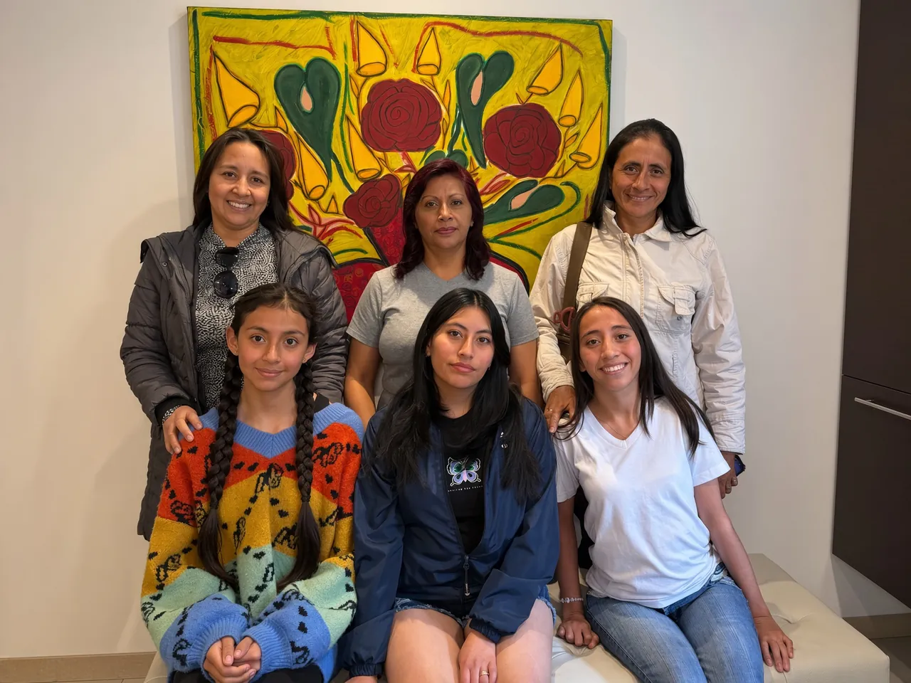 Young adults and caregivers in a clinic consult during an Ecuador outreach day