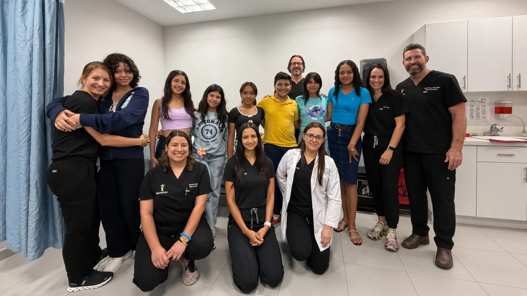Surgeons, staff, and local partners celebrating the moment with local children and young people