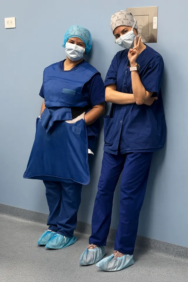 Two SpineHope nurses in scrubs